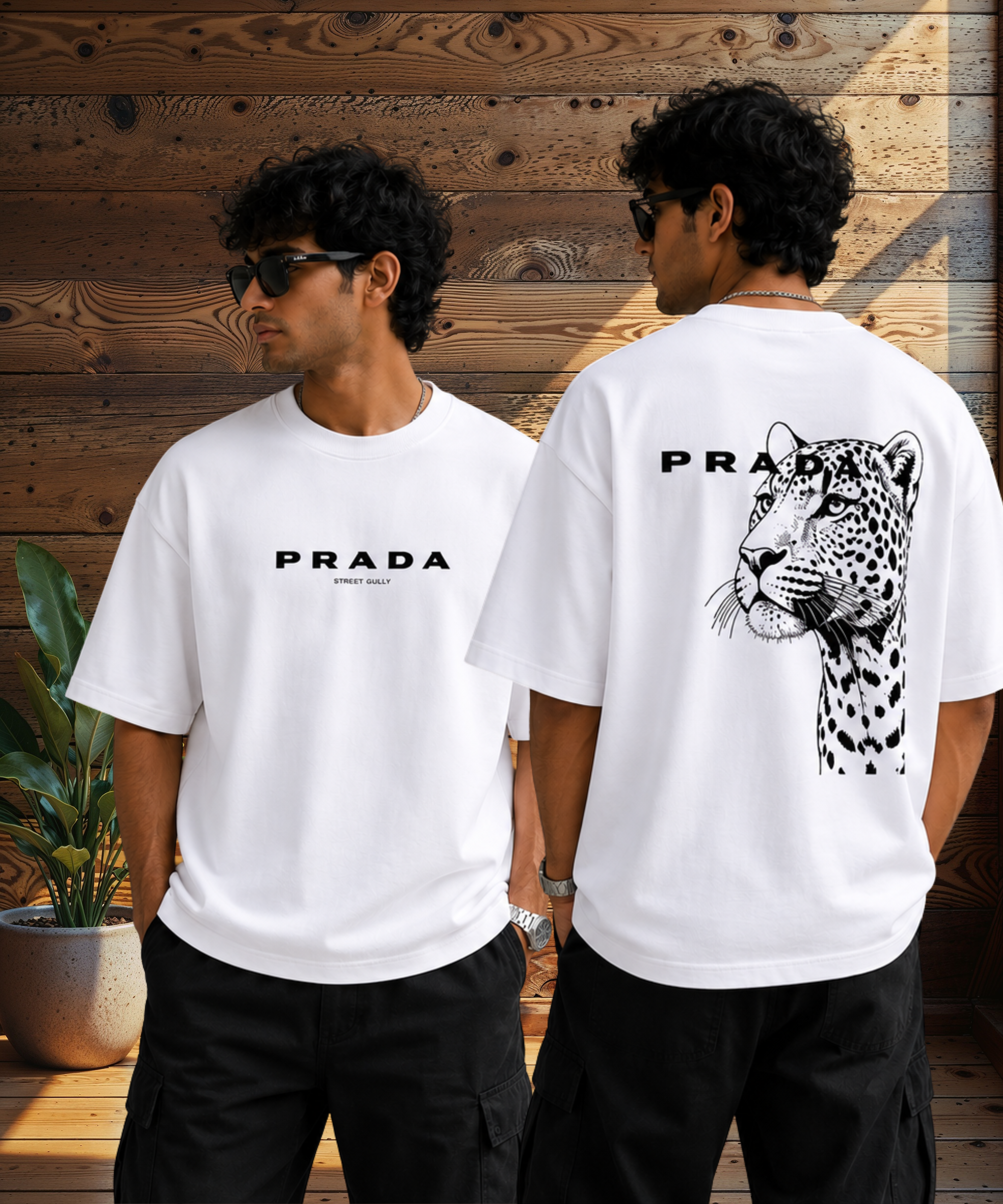 White oversized graphic t-shirt with front PRADA text print and bold leopard artwork on the back.
