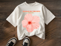 Street Gully floral graphic oversized T-shirt in sand beige, featuring colorful floral print on soft, relaxed-fit fabric.