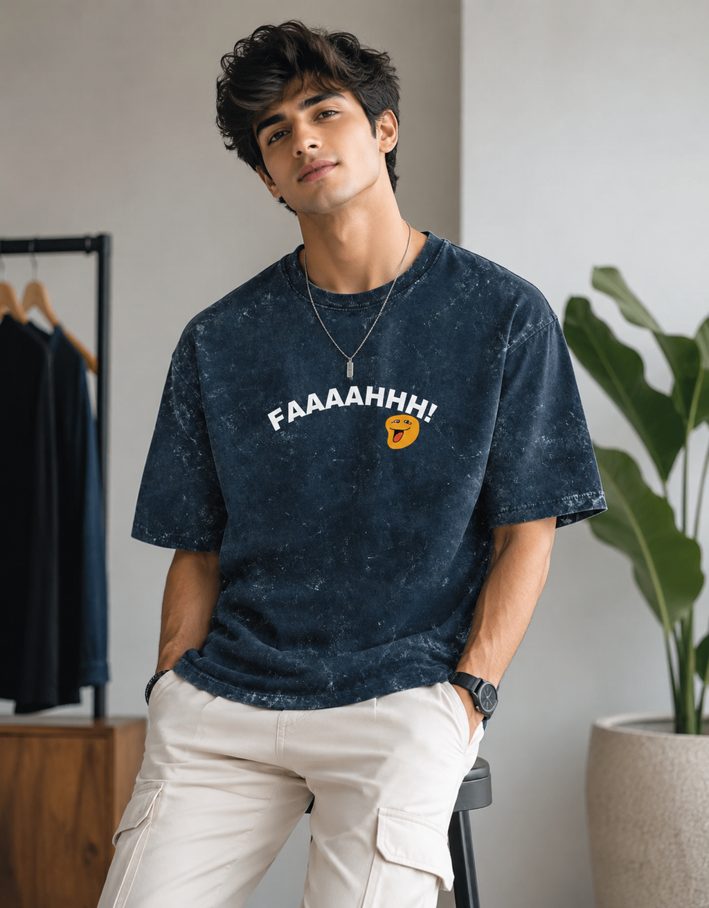 FAAAAHHH! oversized acid wash t-shirt for men in washed navy blue color with vintage streetwear style and relaxed oversized fit worn by male model.